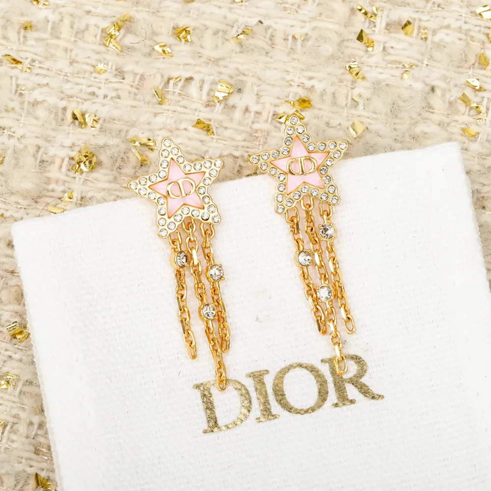 Close-up of silver-tone crystals on Dior Women Petit CD Lucky Baroque Earrings