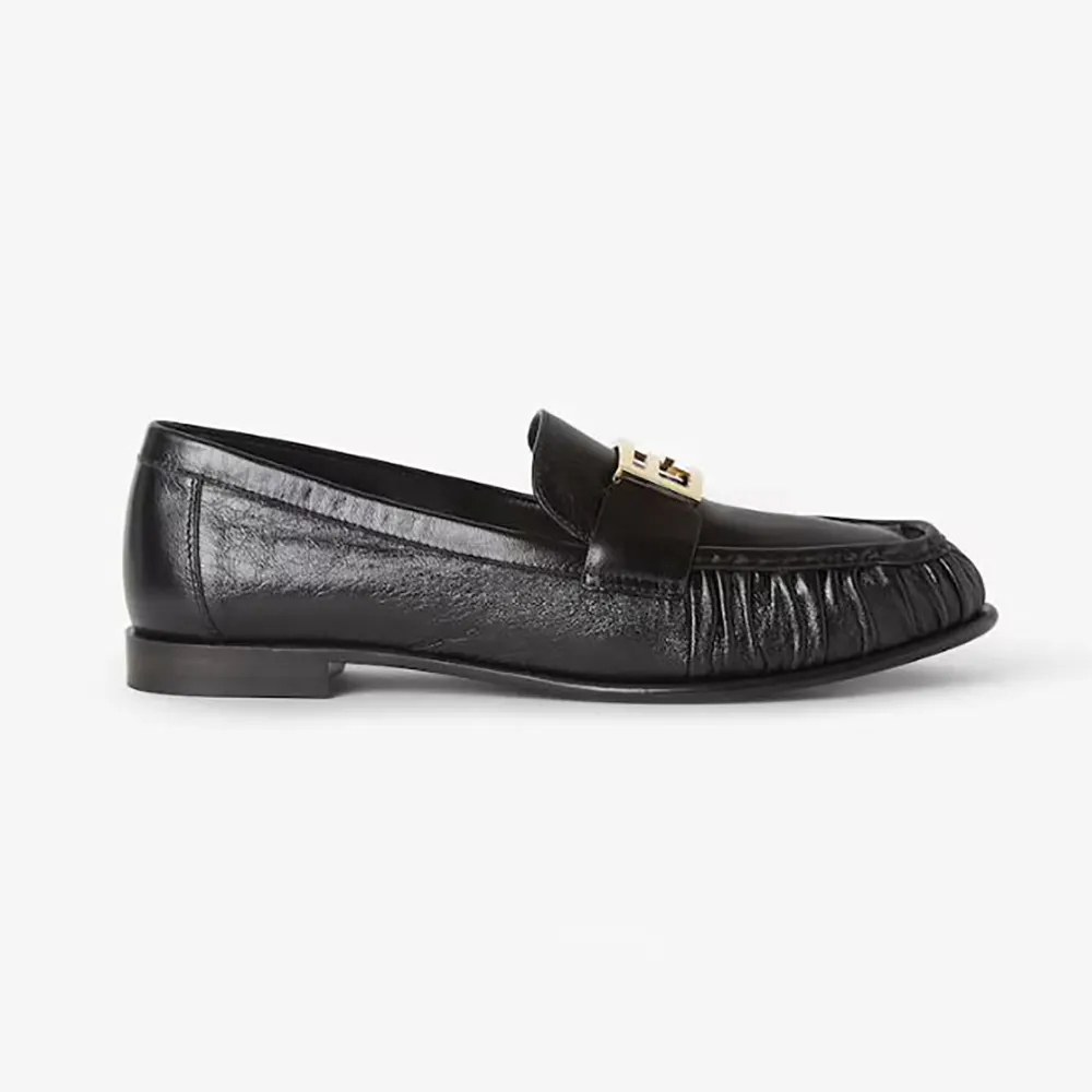 Side angle of Fendi Women Baguette Black Nappa Leather Loafers showing silhouette