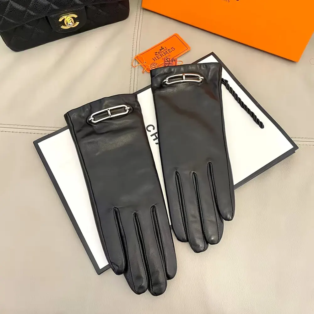 Top view of Hermes Women Gloves in Lambskin Leather-Black showing smooth texture