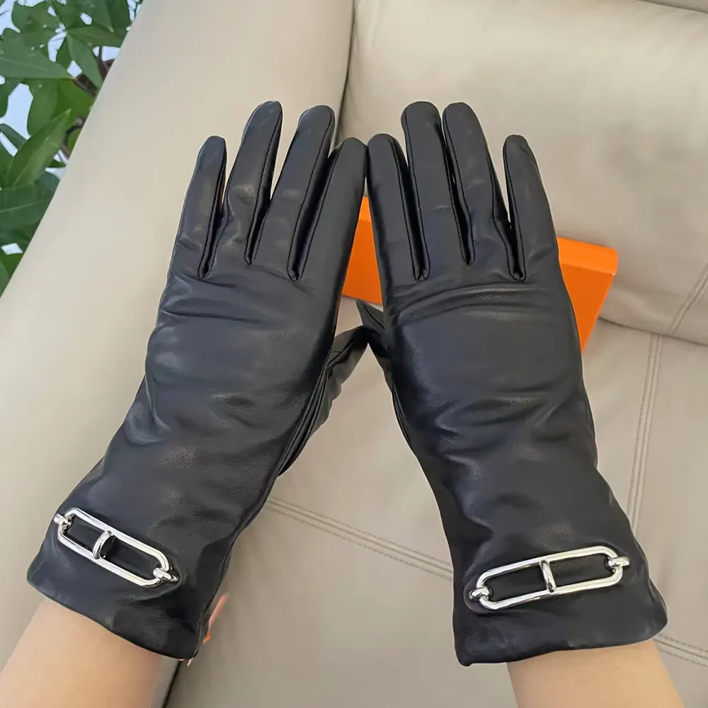 Side angle of Hermes Women Gloves in Lambskin Leather-Black highlighting silhouette