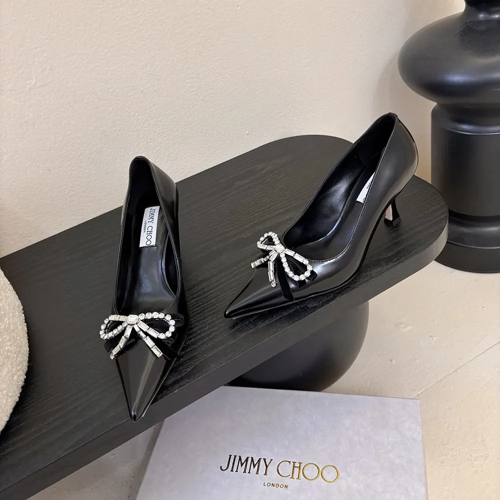Rear angle showing heel height on Jimmy Choo Women Auria Black Pumps