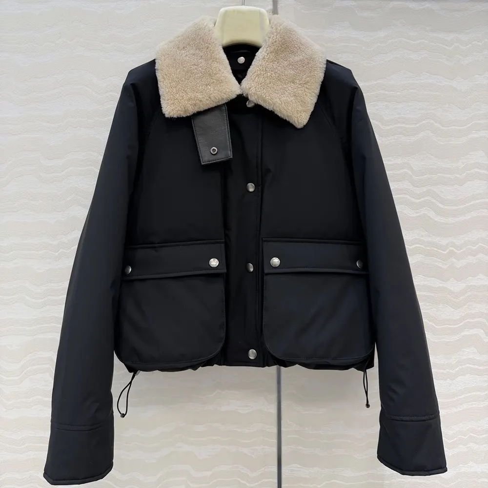 Close-up of shearling texture and Loewe hardware on black puffer