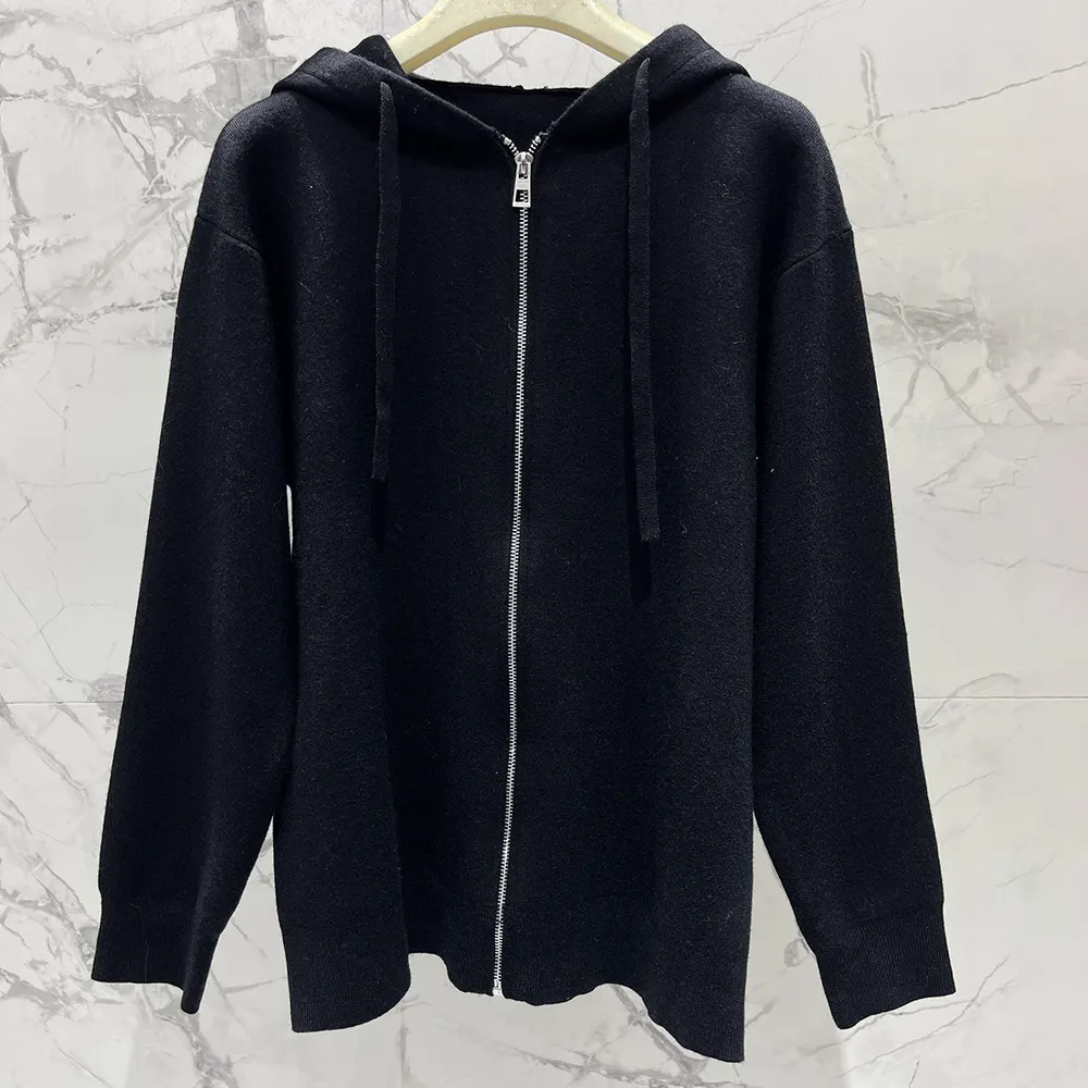 Side angle showing zip closure and relaxed fit of Loewe hoodie
