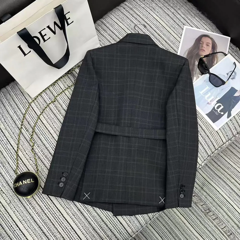 Side angle showing Loewe Women Draped Jacket oversized fit and closure
