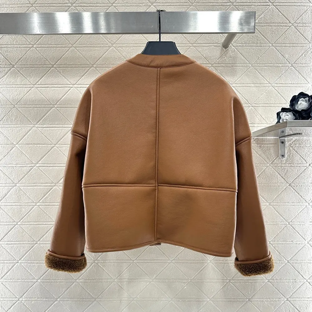 Side profile showing relaxed fit of Loewe Women Pebble Cardigan