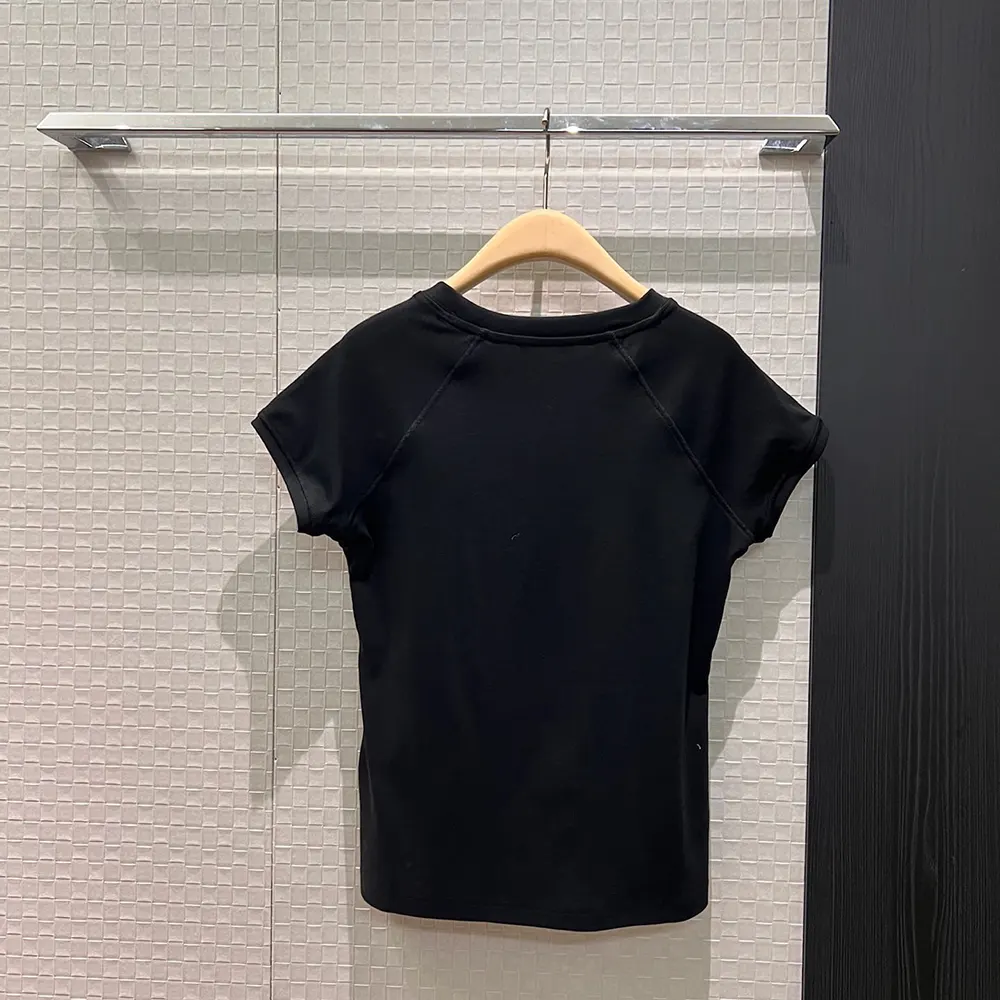 Side angle showcasing small fit silhouette of Loewe Women T-Shirt