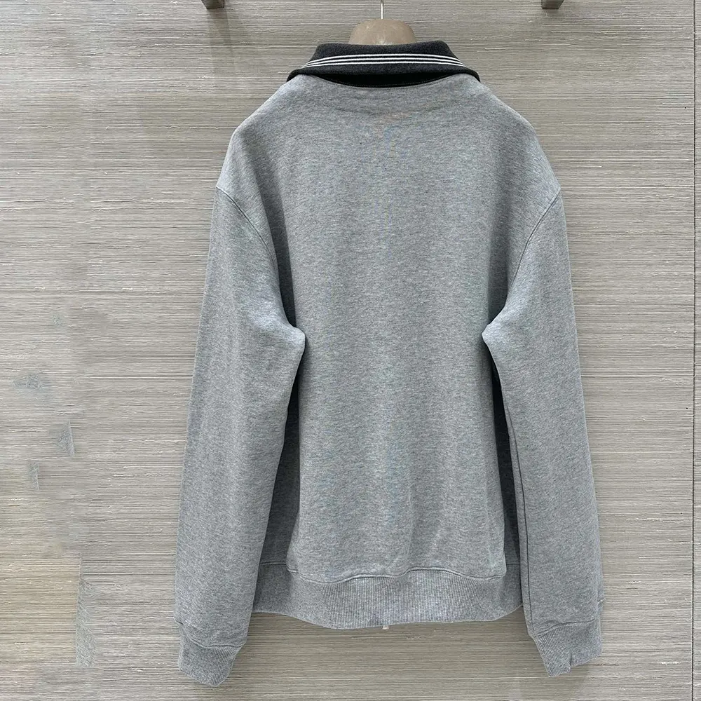 Side angle highlighting relaxed fit of Miu Miu Women Zippered Cotton Fleece Jacket