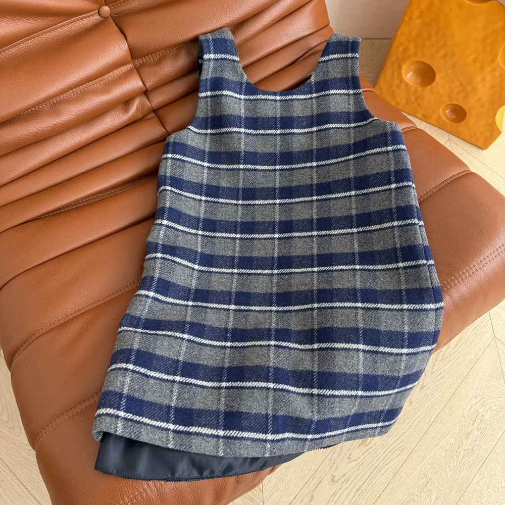 Side angle showing silhouette of Miu Miu Women Checked Mini-Dress