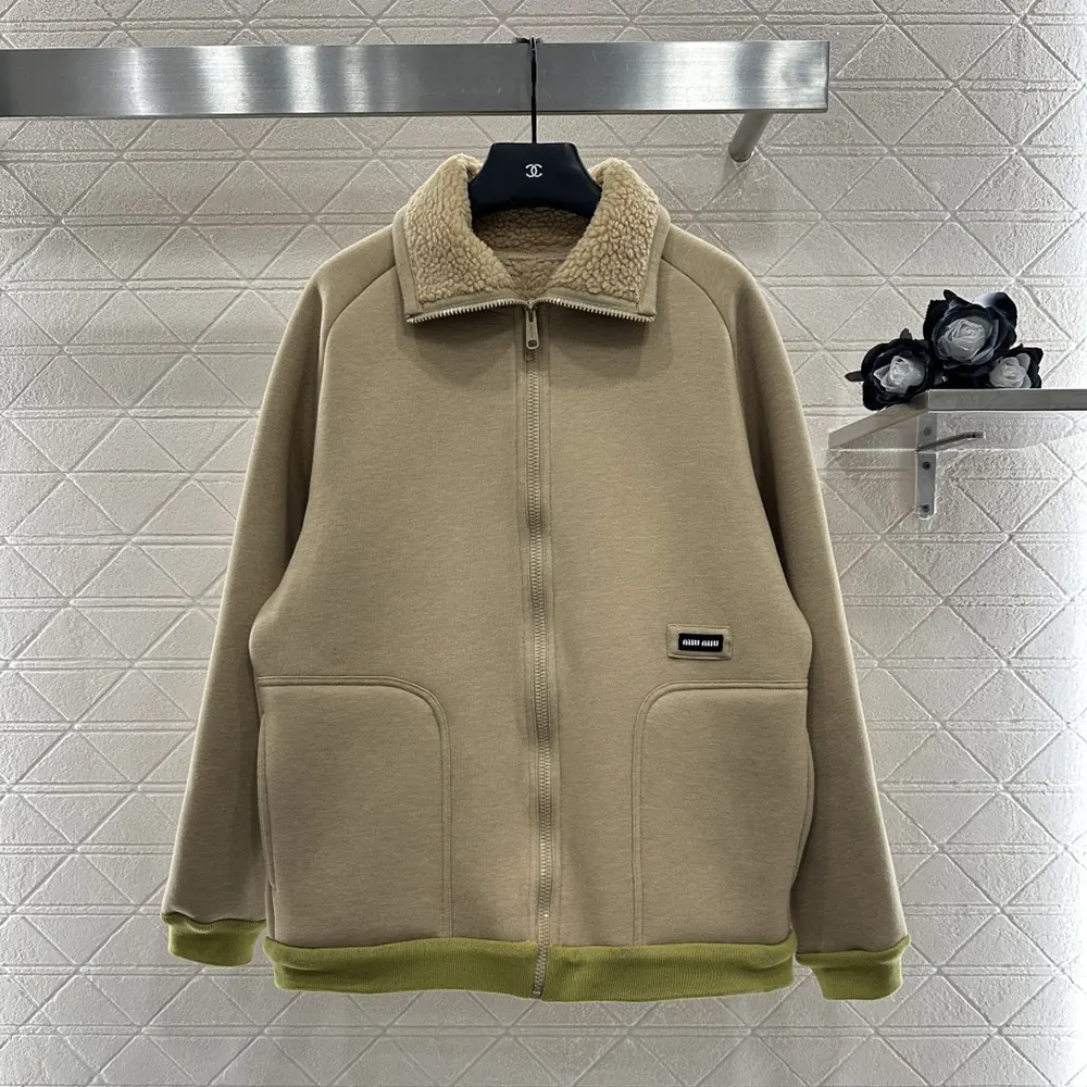 Close-up of zipper detail on Miu Miu Cotton Fleece Blouson Jacket