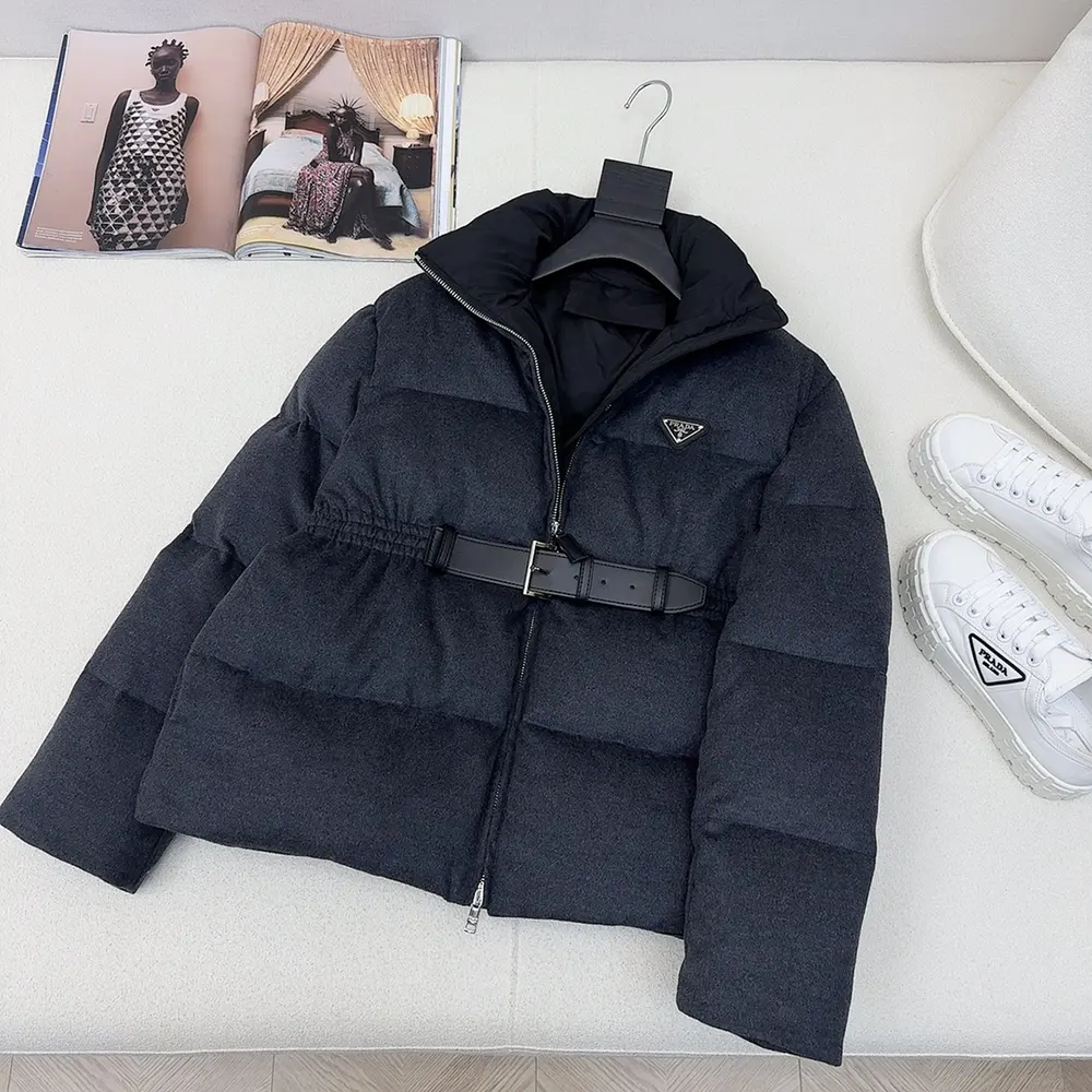 Close-up of grey loden wool fabric on Prada Men Loden Down Jacket