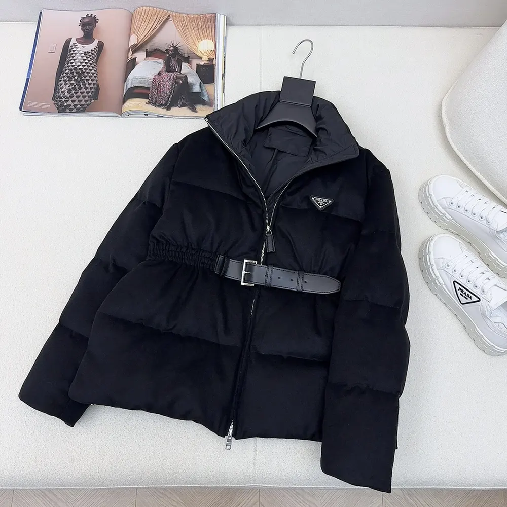 Close-up of Prada logo tab on sleeve of Women Loden Down Jacket-Navy