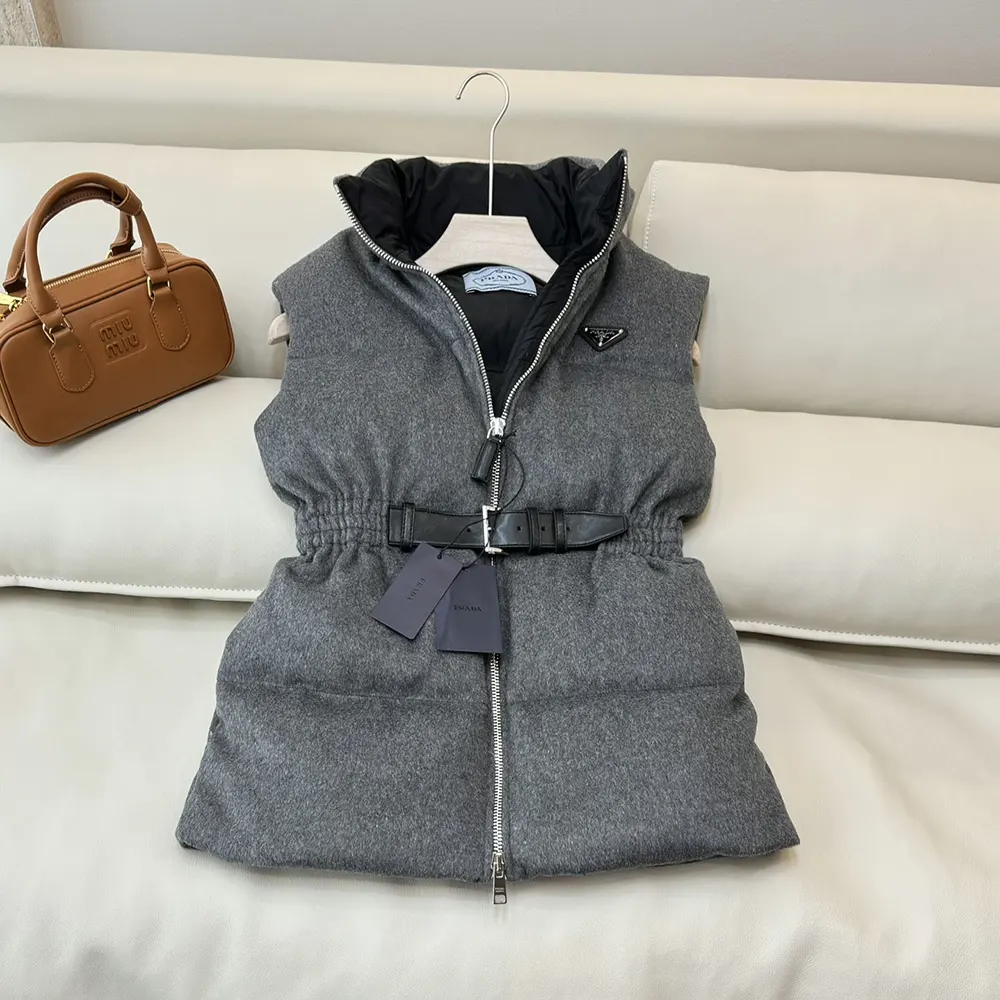 Side profile of Prada Women Loden Down Vest-Grey with quilted detail
