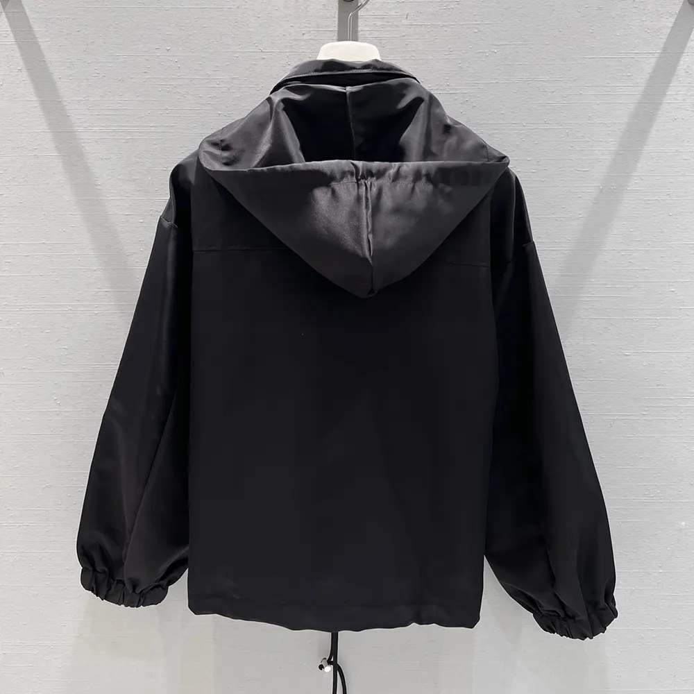 Side profile showing silhouette of Prada Women Re-Nylon Blouson Jacket-Black
