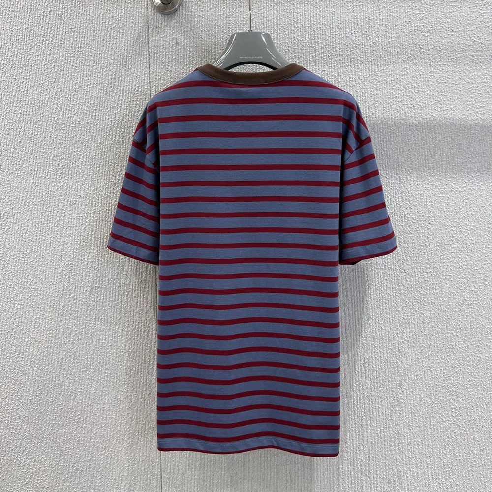 Side angle showcasing relaxed fit of Prada Women Oversized Striped Jersey T-Shirt