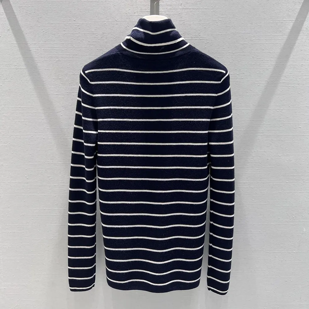 Side profile showing fit and turtleneck shape of Prada Men Sweater
