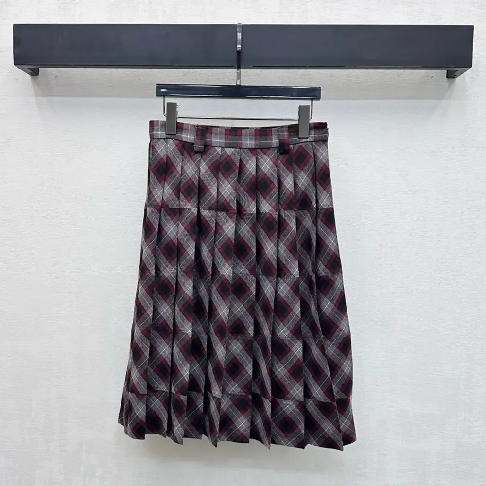 Side angle showing midi length and A-line silhouette of Prada skirt