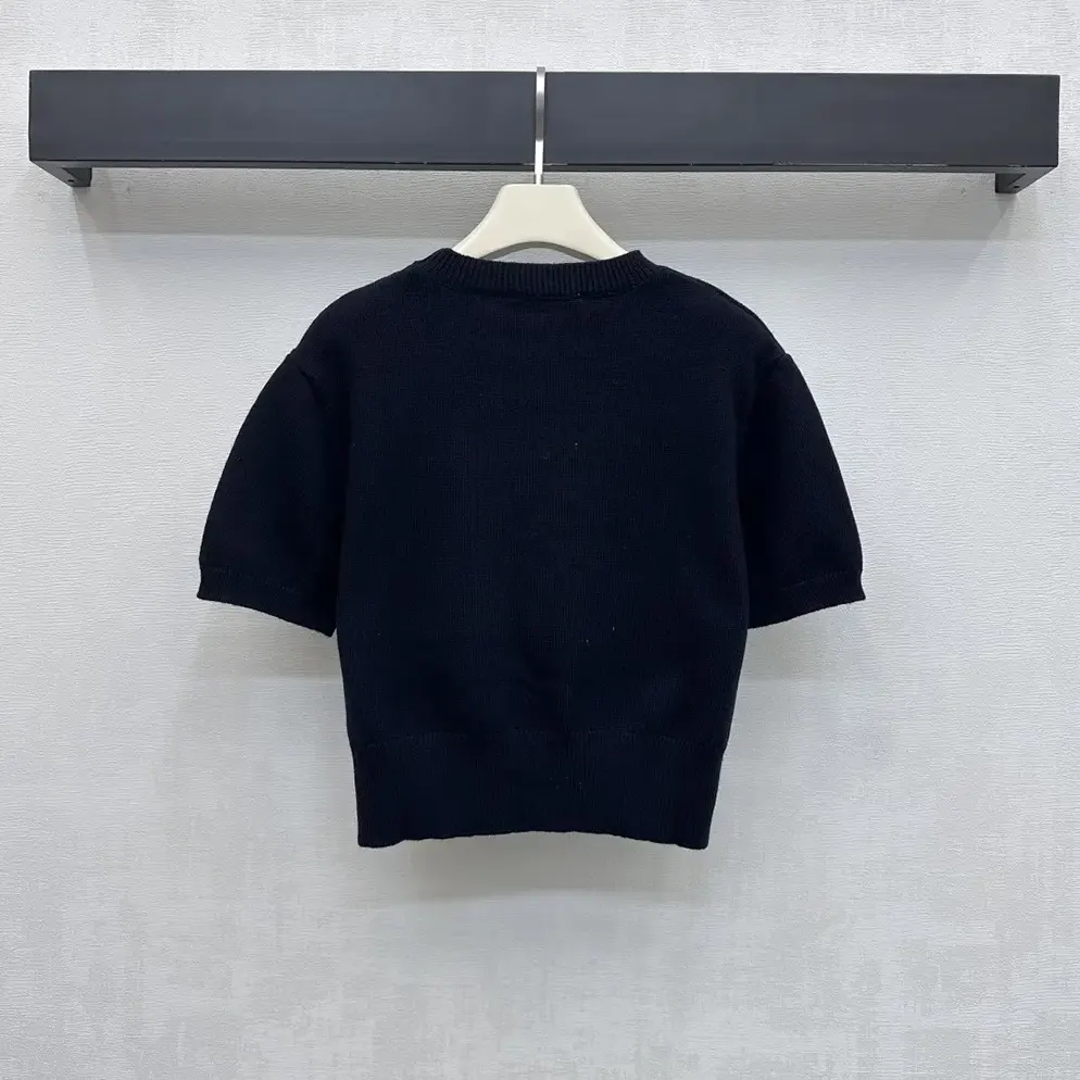 Side angle showing silhouette of Prada Women Wool And Cashmere Crew-Neck Sweater-Black