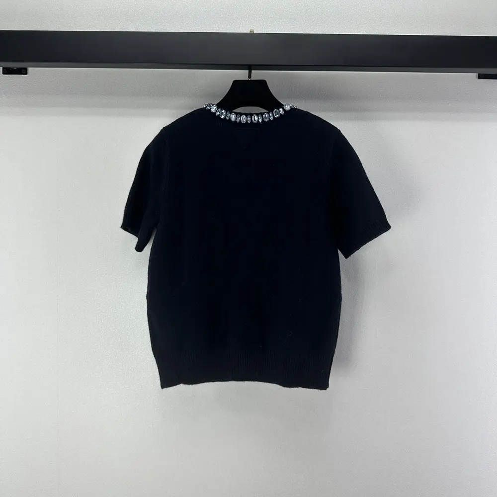 Side detail showing crew neck and sleeve on Prada Women Wool And Cashmere Crew-Neck Sweater-Navy