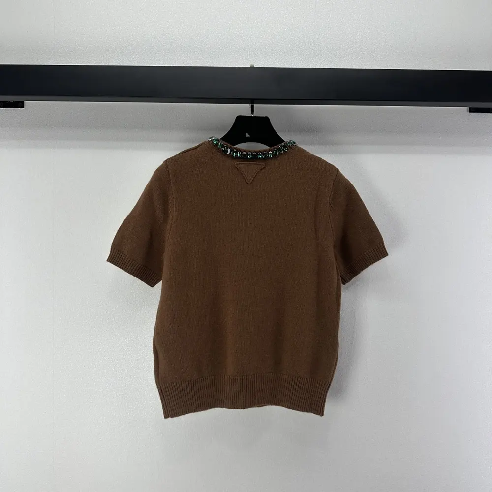 Side angle showing fit and silhouette of Prada Women Wool And Cashmere Sweater