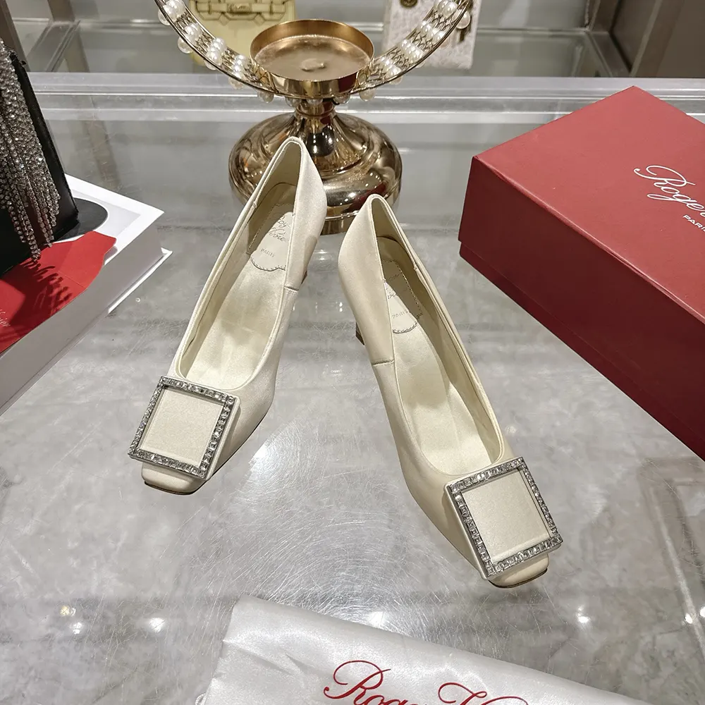 Rear angle showing heel height on Roger Vivier Women Trompette Pumps