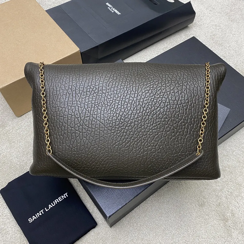 Side angle showing lambskin texture on Saint Laurent YSL Cassandre pouch