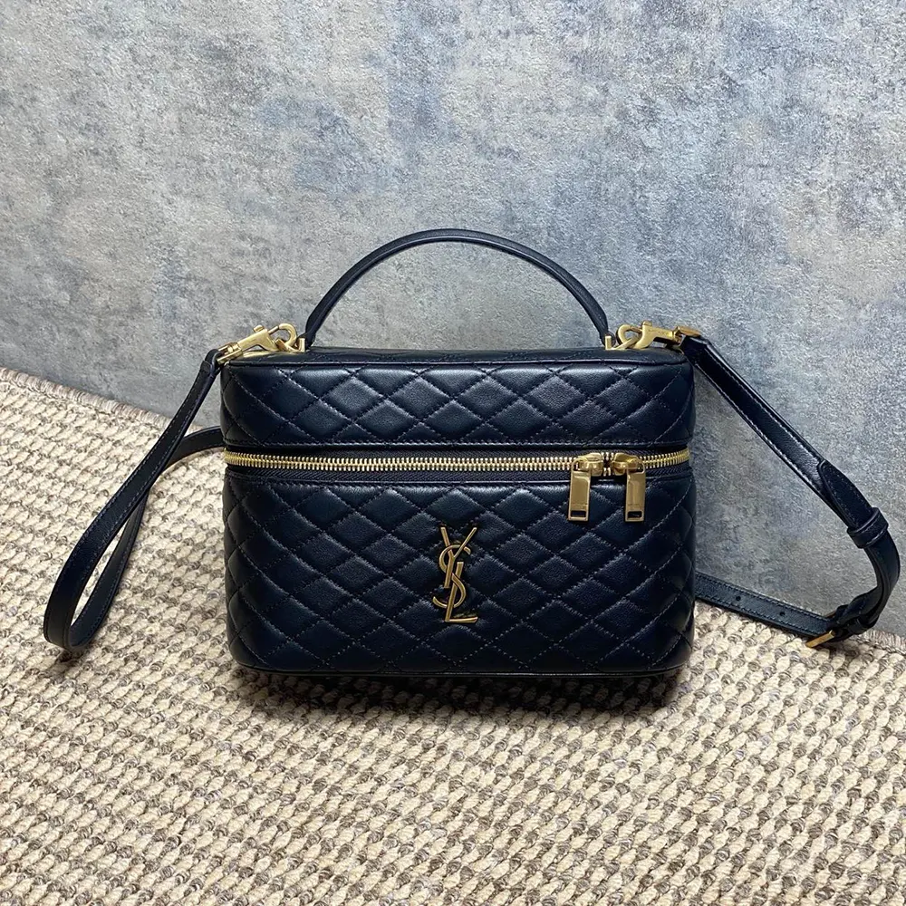 Close-up of gold YSL hardware on Saint Laurent YSL Women Gaby Vanity Bag