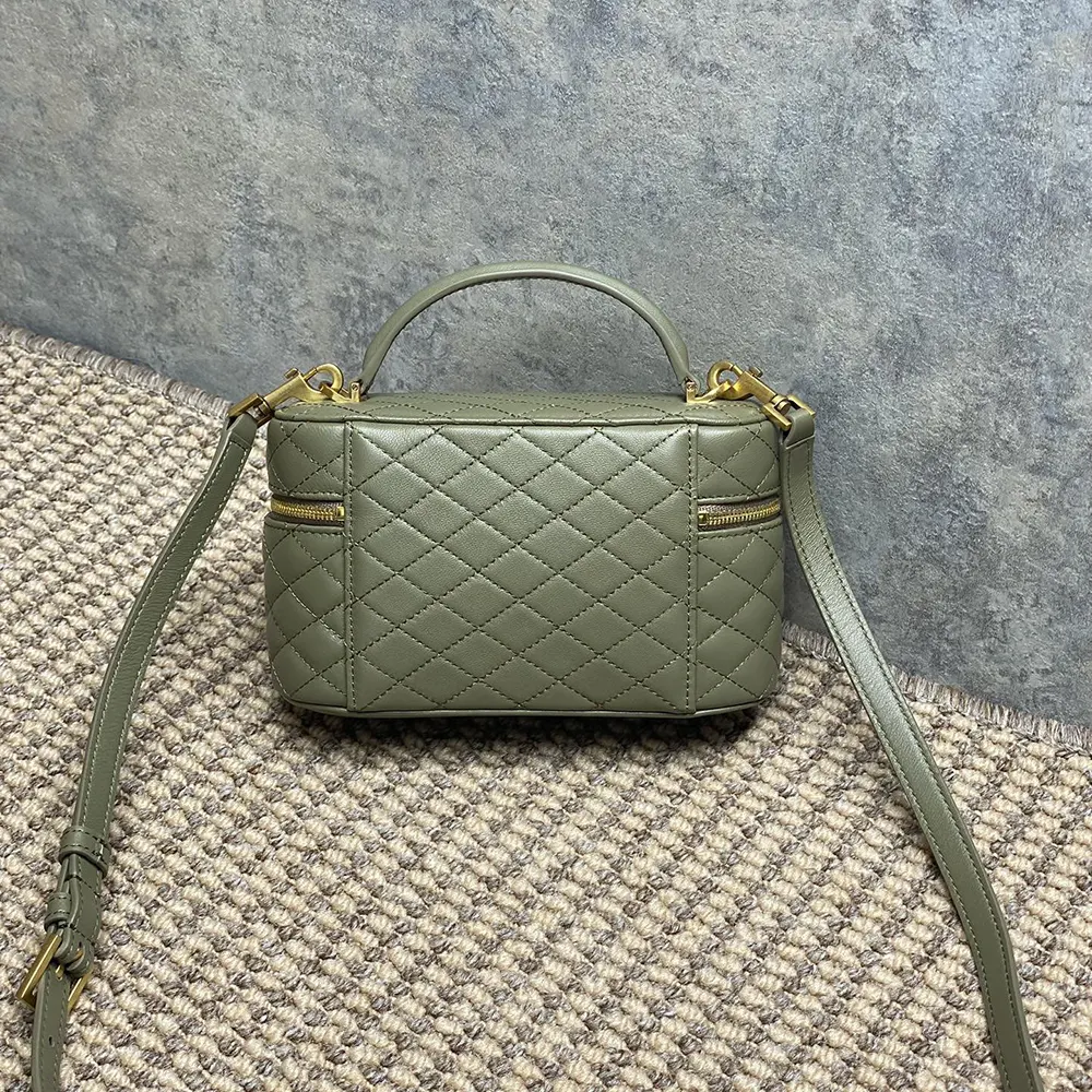 Side profile showing compact silhouette of Saint Laurent YSL Gaby Vanity Bag