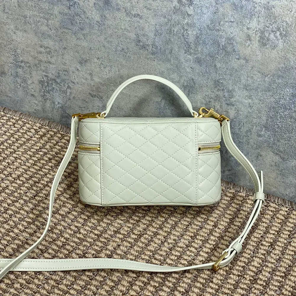 Side angle showing silhouette of Saint Laurent YSL Gaby Vanity Bag White