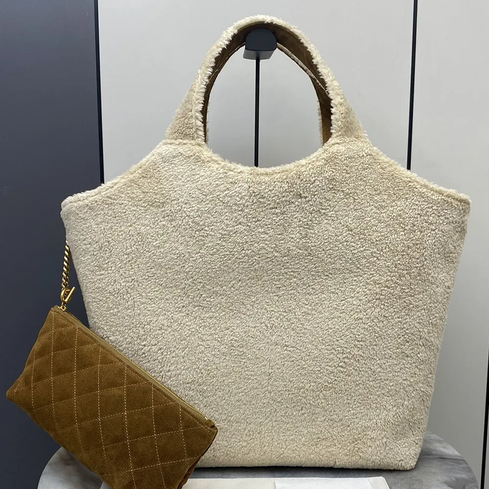 Side angle showing plush shearling texture of Saint Laurent YSL Icare bag