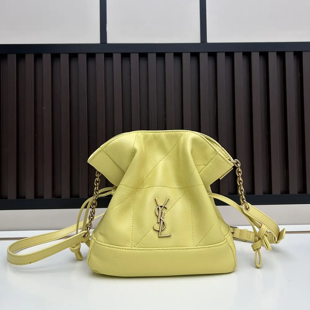 Close-up of gold YSL logo and lambskin texture on Jamie Mini Shoulder Pouch