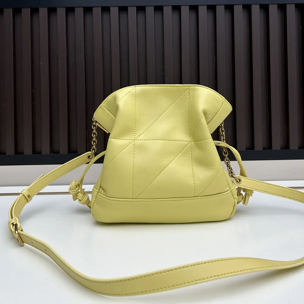 Side angle showing magnetic closure on Saint Laurent YSL Jamie Mini Shoulder Pouch
