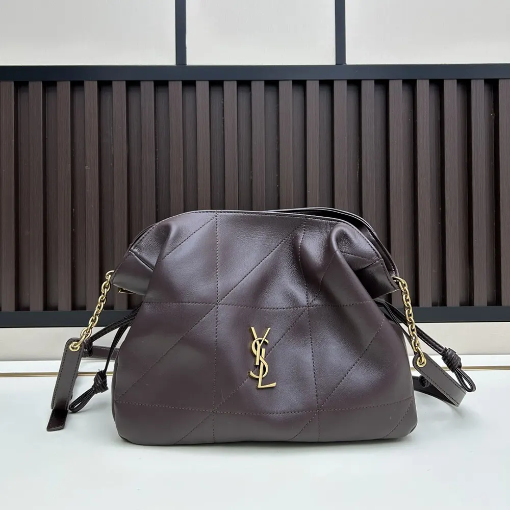 Close-up of gold YSL logo on Saint Laurent Jamie Shoulder Pouch