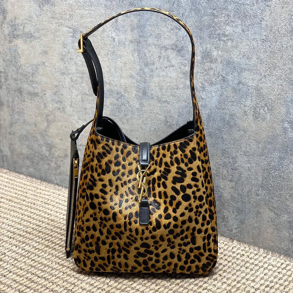 Close-up of brown pony hair texture on Saint Laurent YSL Women Le 5 À 7 bag