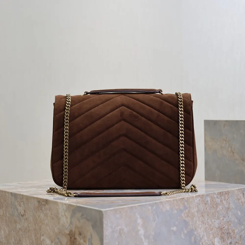 Side angle showing suede texture and quilting on Saint Laurent Loulou Large