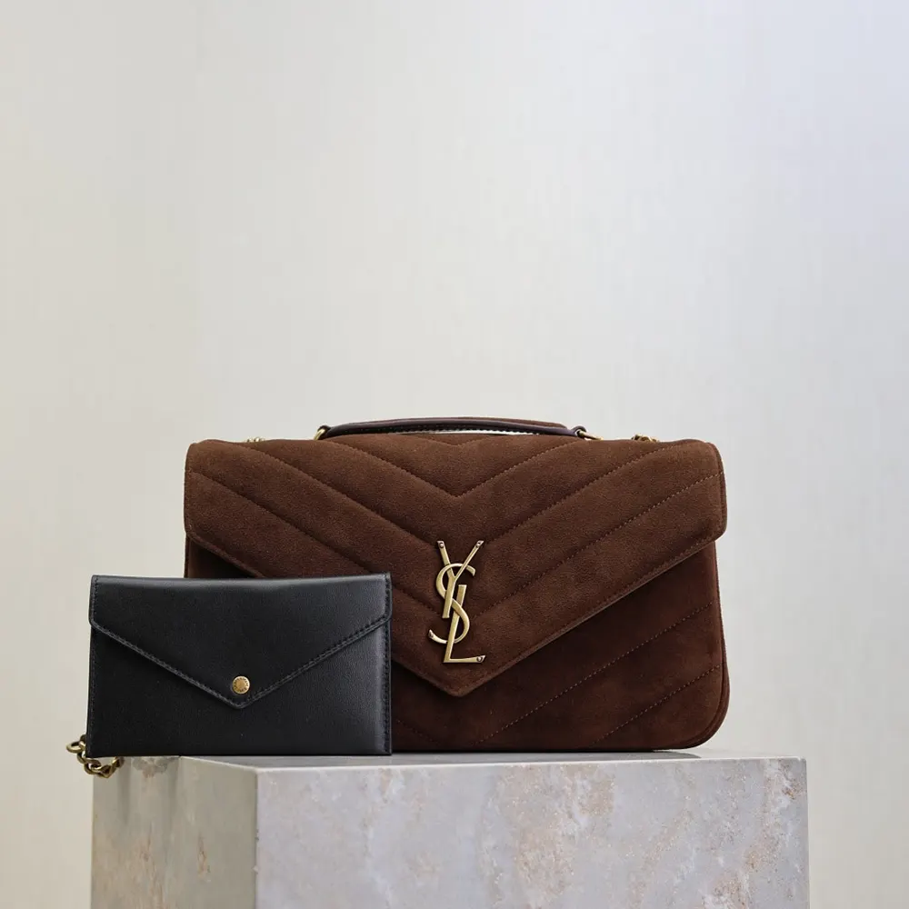 Close-up of gold YSL logo hardware on Loulou Medium suede bag