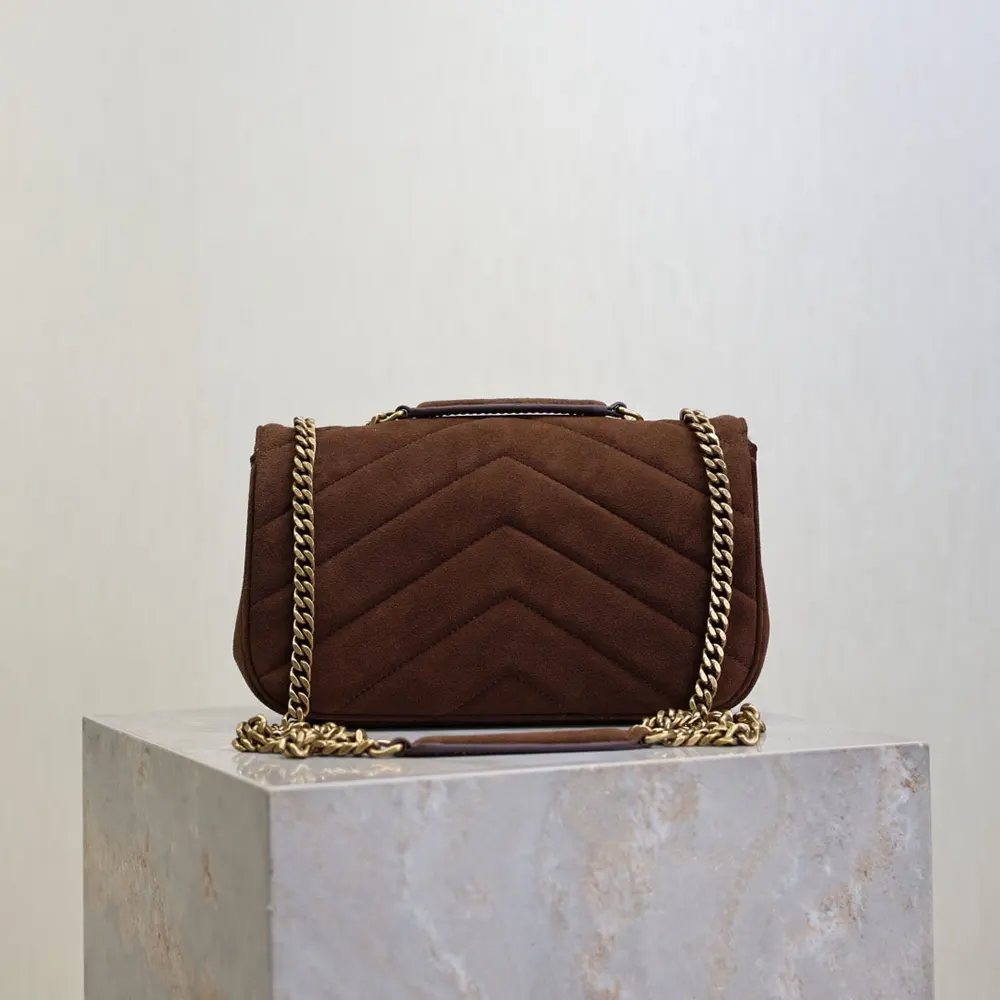 Side angle showcasing shoulder strap and suede texture on Saint Laurent YSL bag