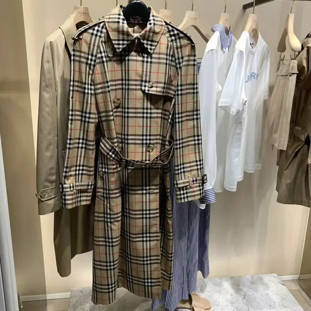 Close-up of signature check lining inside Burberry Women Check Trench Coat-Sandy