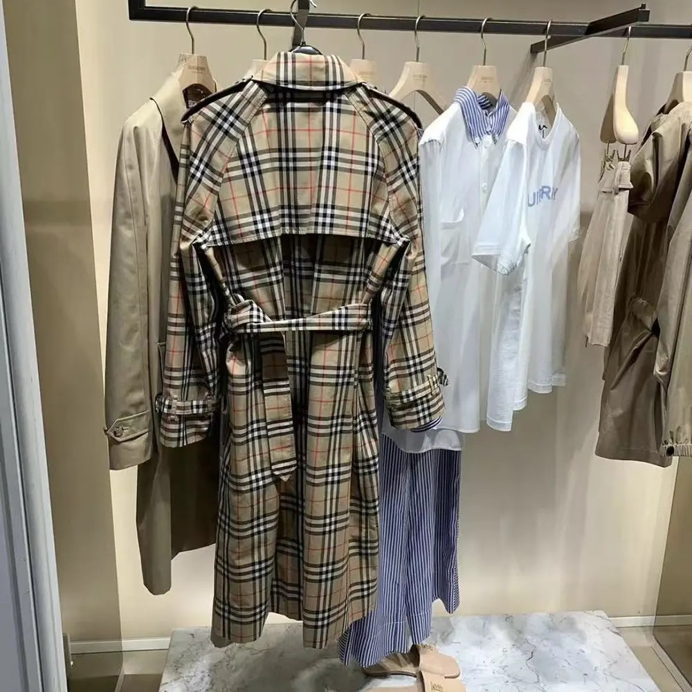 Side angle highlighting tailored fit of Burberry Women Check Trench Coat-Sandy