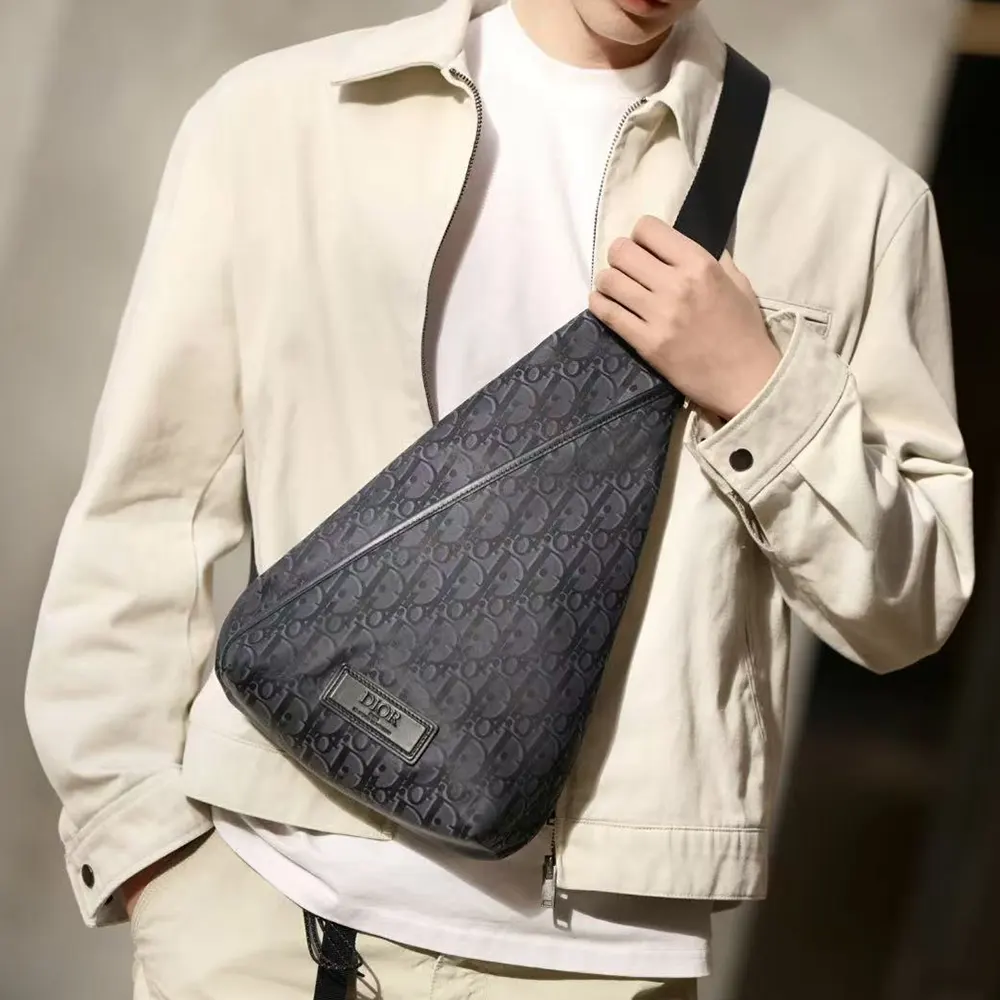 Side view showing adjustable strap of Dior Men Trek Zipped Sling Bag