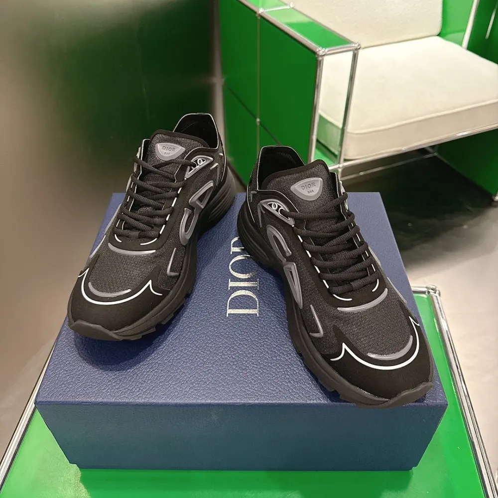 Overhead shot showing Dior logo hardware detail on B30 Countdown sneaker