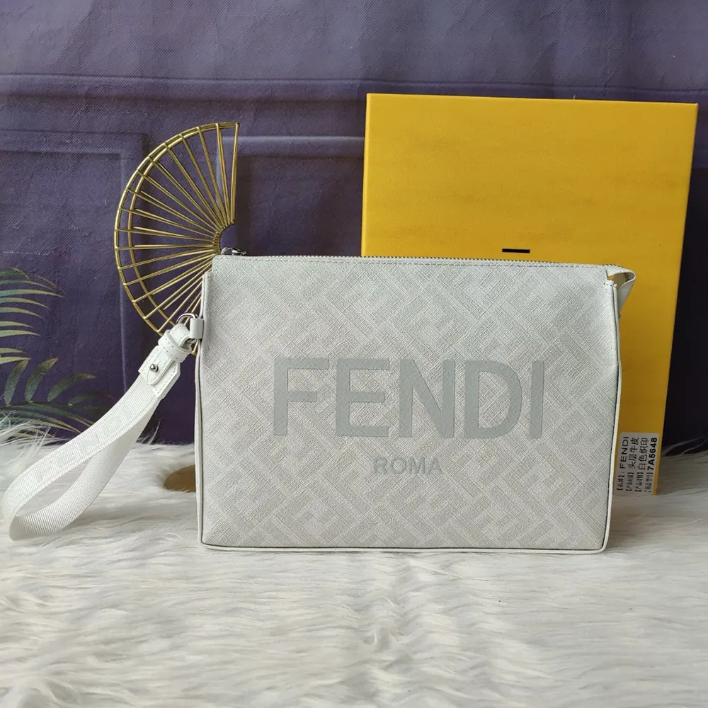 Close-up detail of white FF fabric and silver hardware on pouch