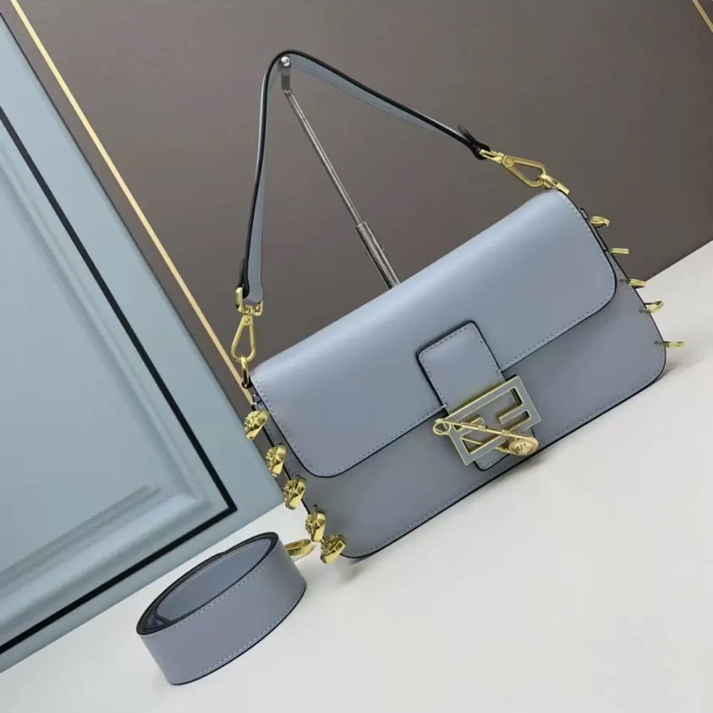 Front view of Fendi Women Baguette Brooch Fendace Blue Leather Bag