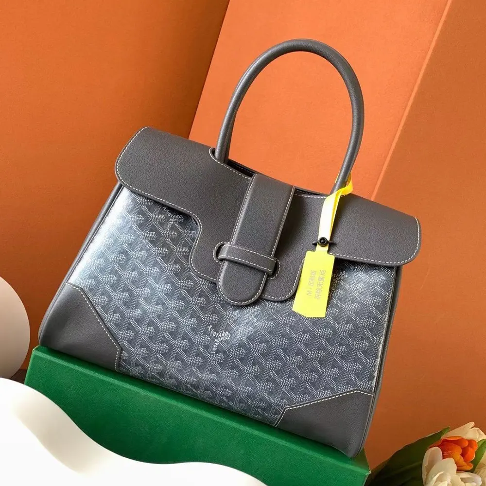 Close-up detail of brass hardware on Goyard Women Saïgon Tote Bag-Grey