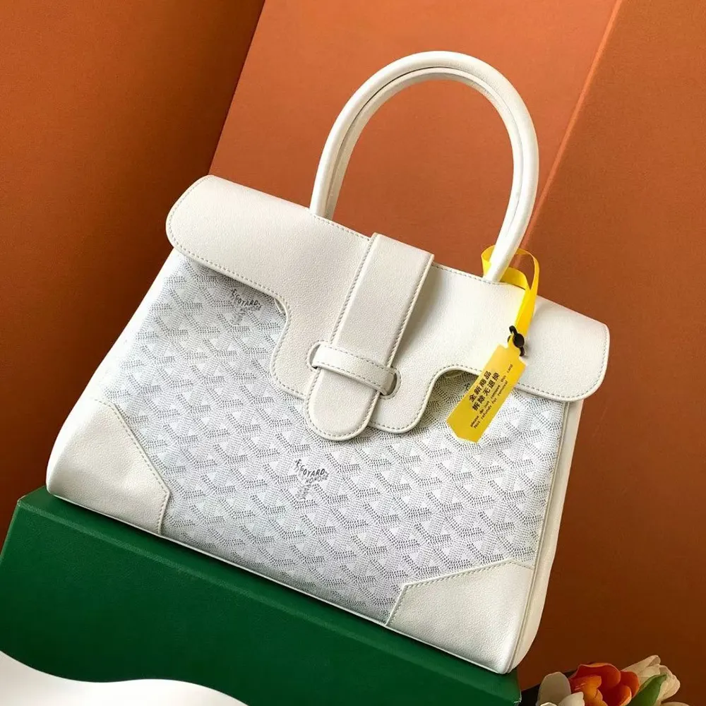 Side angle showing spacious interior and zip closure of Saïgon Tote Bag
