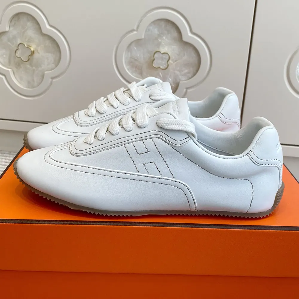 Top-down angle showing lacing and silhouette of Hermes Master sneaker