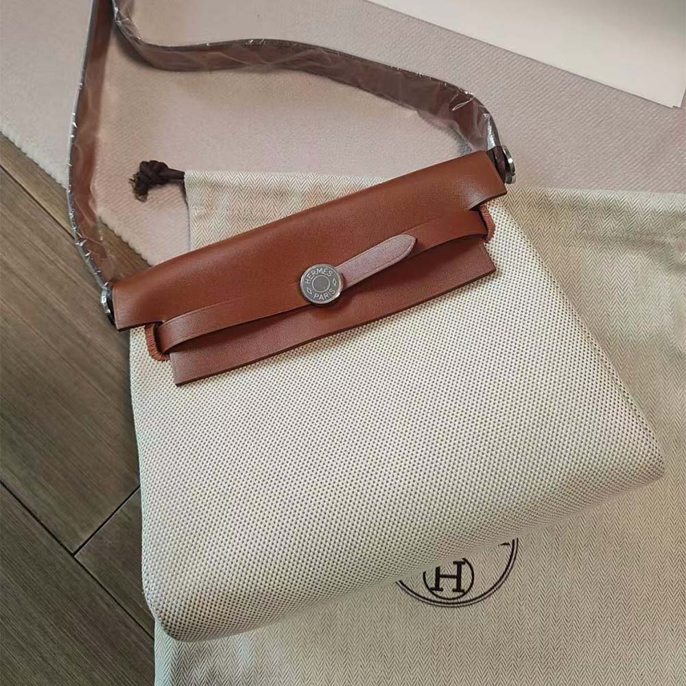Close-up of brown leather texture on Hermes Women Herbag Zip 20 Bag-Brown