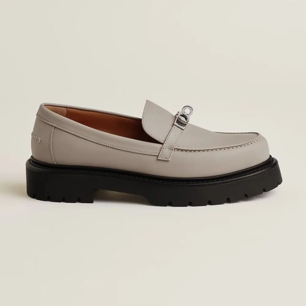 Front angle of Hermes Women Icone Loafer in Calfskin-Gray showing signature hardware