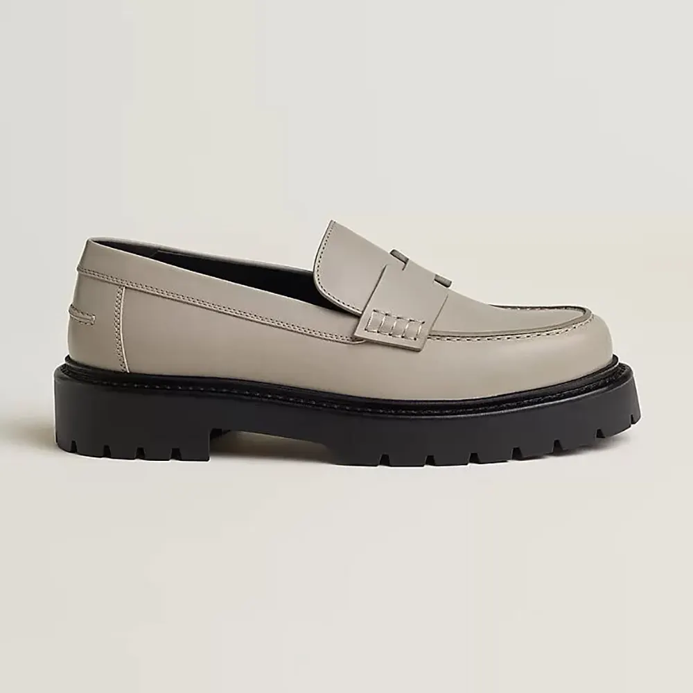 Side view of Hermes Women Klement Loafer in Calfskin-Gray with signature hardware
