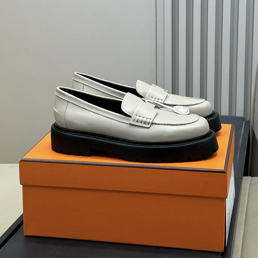 Top angle showing classic silhouette of Hermes Women Klement Loafer in gray