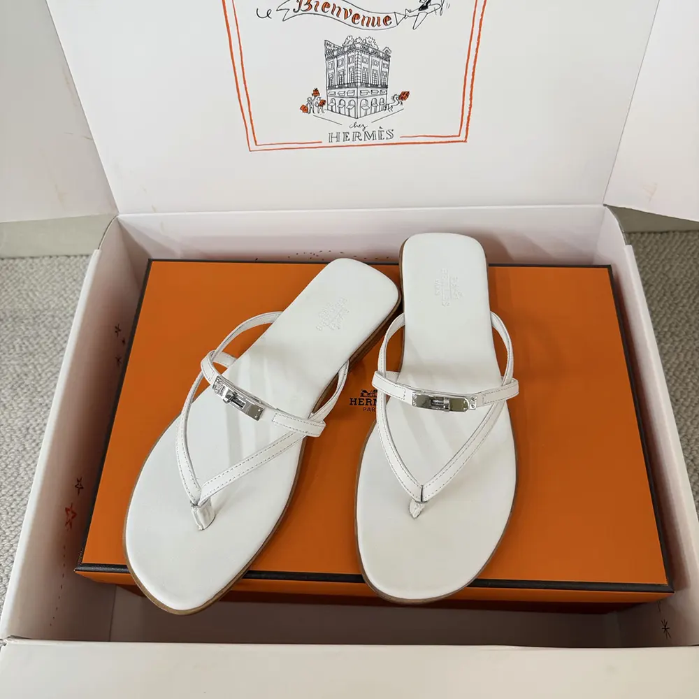 Top view of Hermes Women Miss Sandal highlighting smooth leather texture and open design